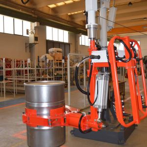 column movable industrial manipulator holding a barrel